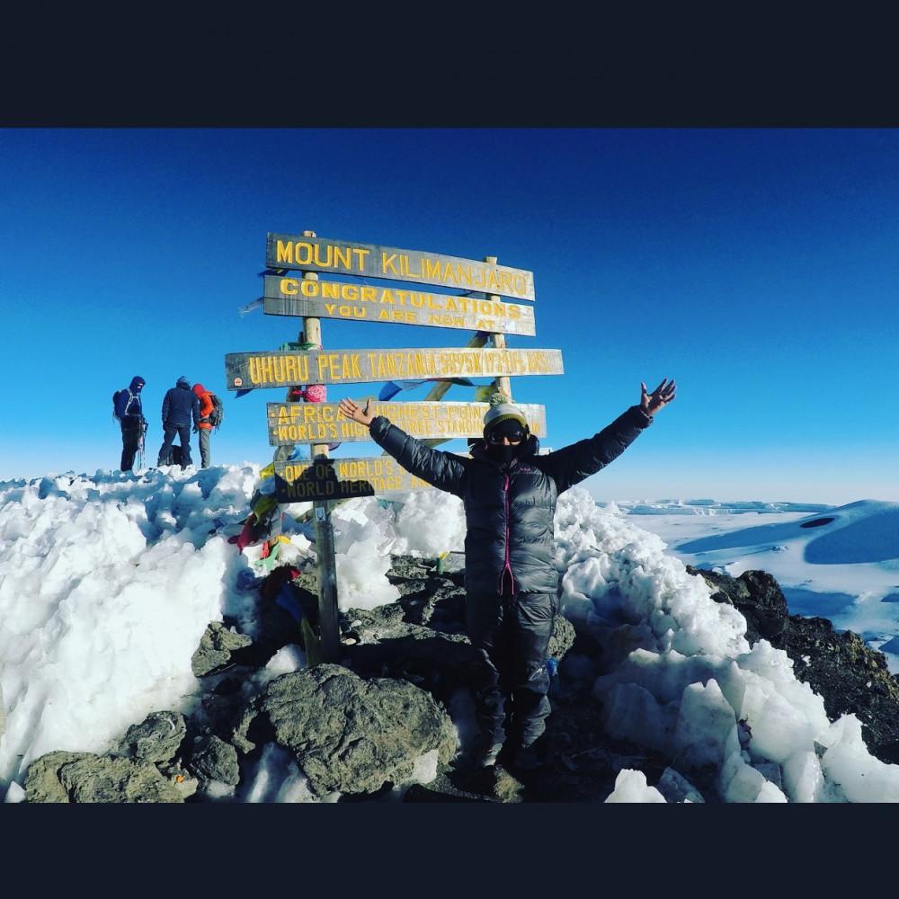 Dr. Jenhangir atop Mount Kilimanjaro